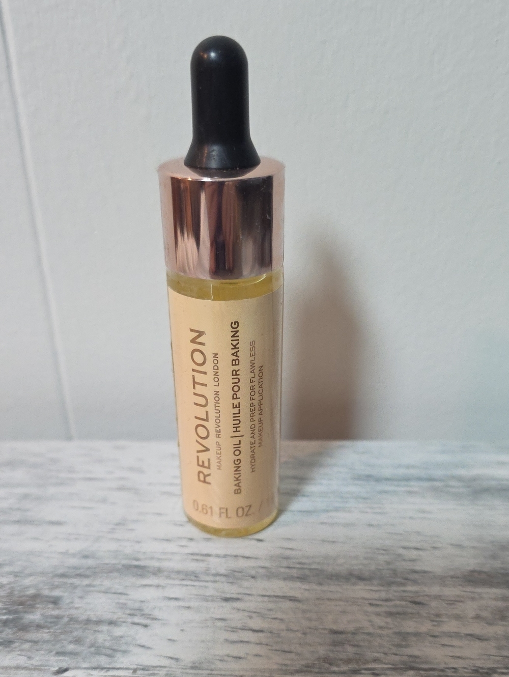 Revolution Baking Oil Primer - Yellow, Rose Gold Cap